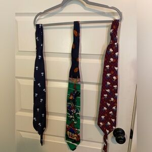 Three fun vintage ties. Snoopy and Looney tunes. There are wrinkles from use.